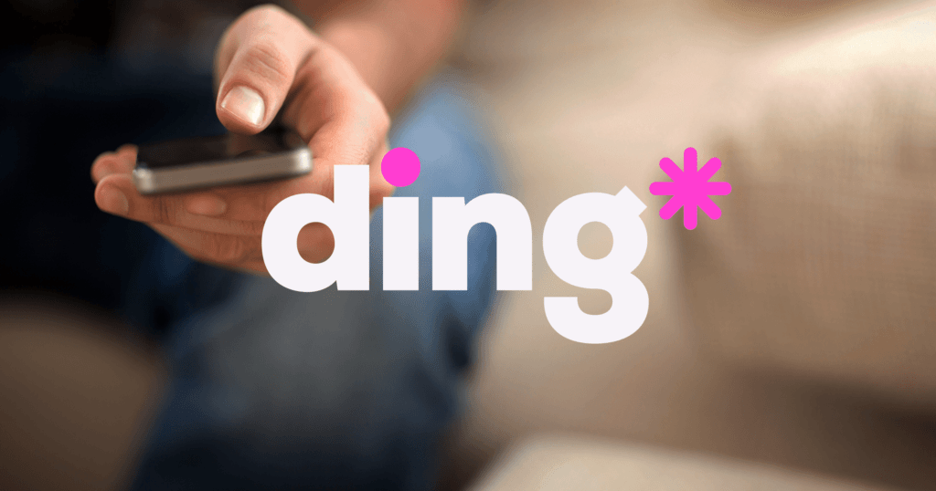 A close-up of a person's hand holding a smartphone with the 'ding' logo in the foreground.